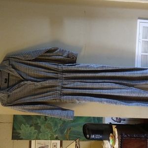 Lucca black and white jumpsuit long sleeve size medium.